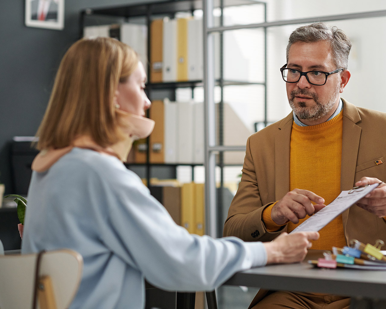 Employee discussing workplace benefits and support options with an advisor.